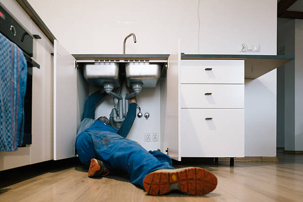 Professional Drain Cleaning technician working in Warsaw, VA